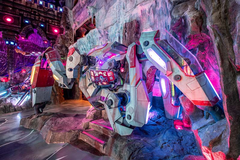 large machine surrounded by icy cave walls at Meow Wolf Denver