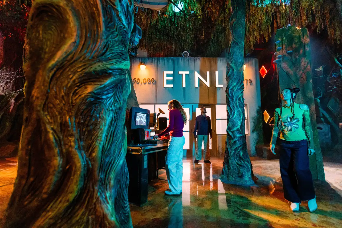 Guests are exploring the front of the exhibit at Meow Wolf's Radio Tave. 
