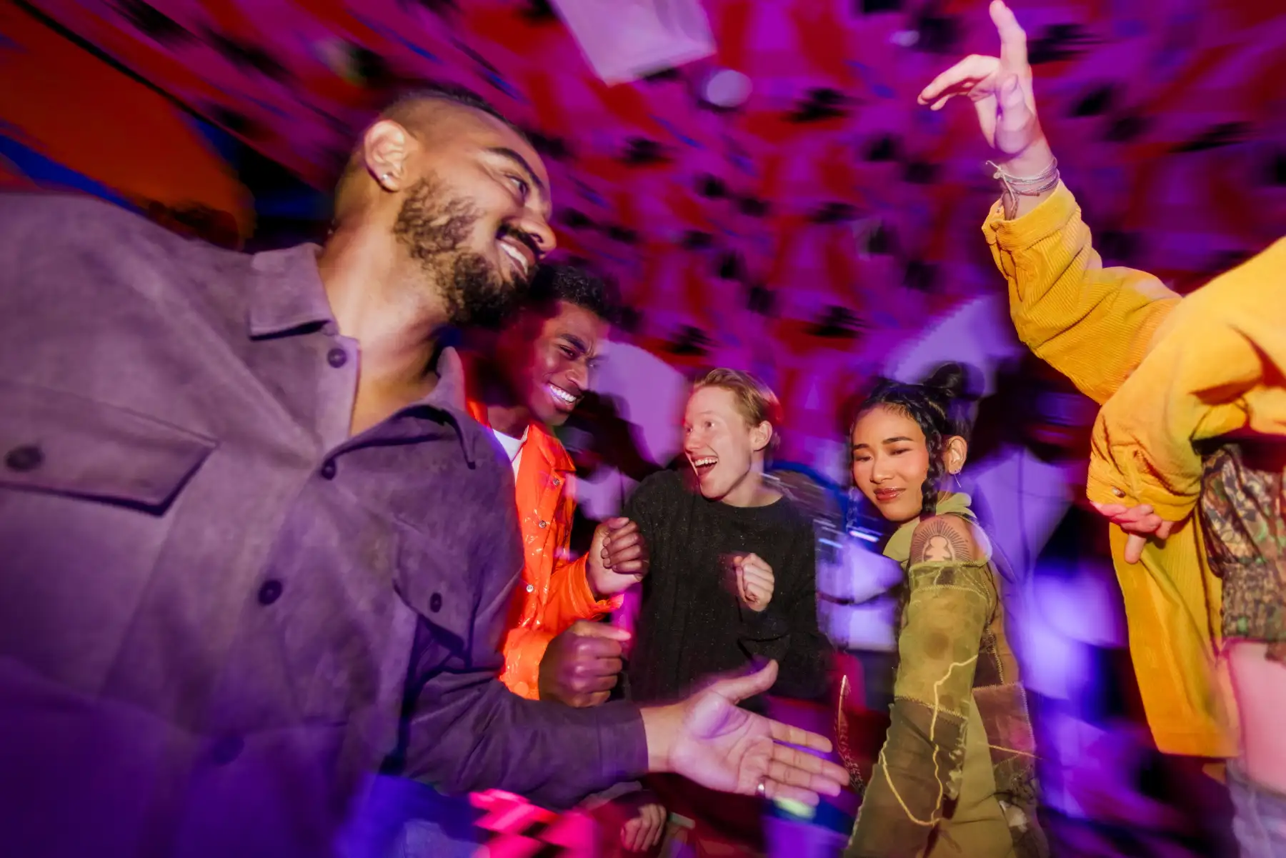 A group of visitors are enjoying themselves at Meow Wolf Radio Tave. 