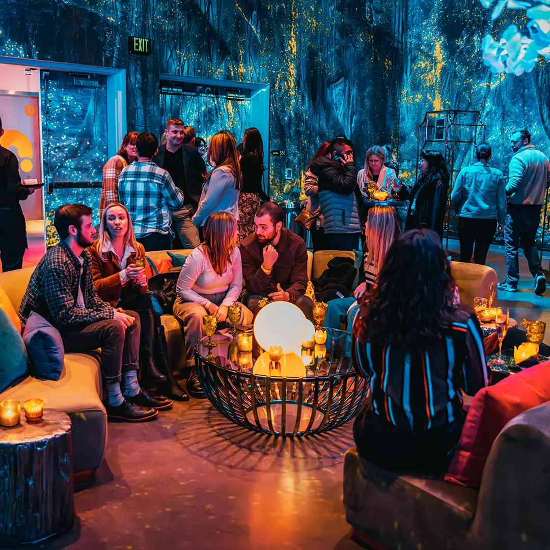 People at a corporate event at Meow Wolf Houston