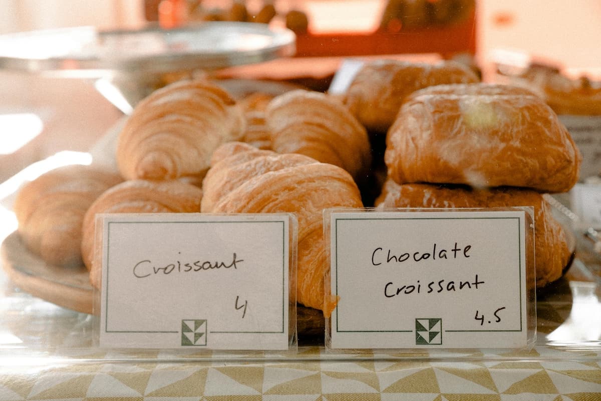 pile of croissants on a table