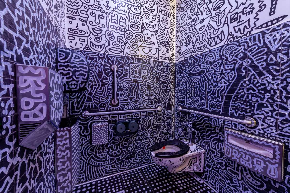 A black and white patterned restroom.