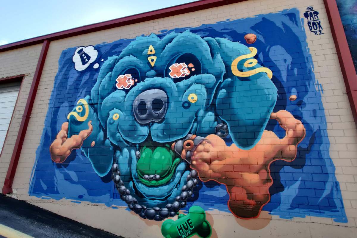 Scott Tarbox’s dog mural on the side of a warehouse