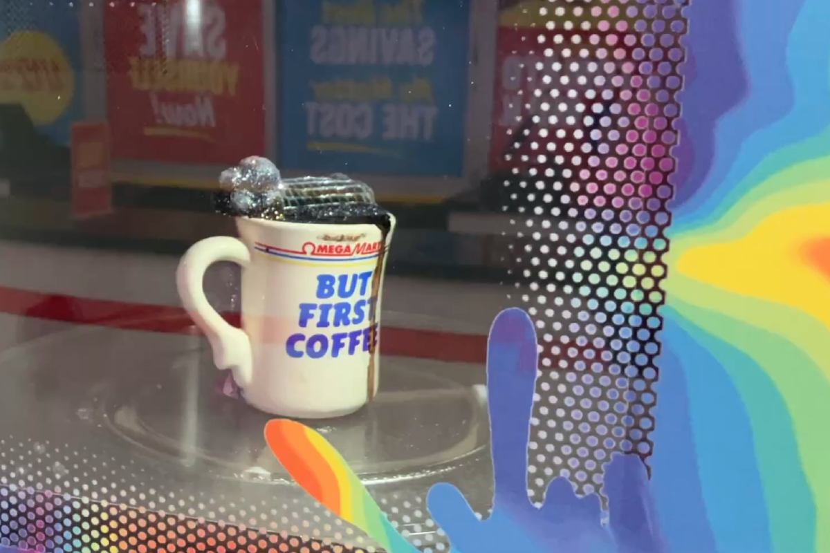A coffee mug overflows in a rainbow microwave with disco-ball like material.