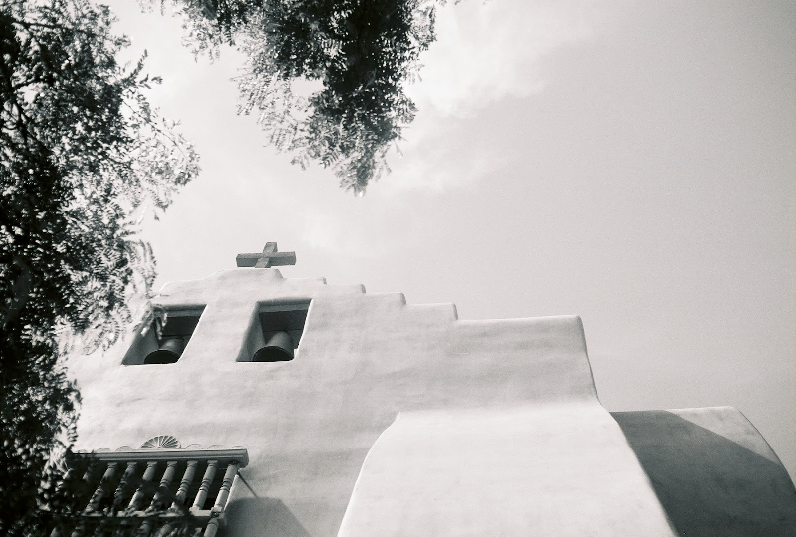 black and white image of a church in New Mexico style building