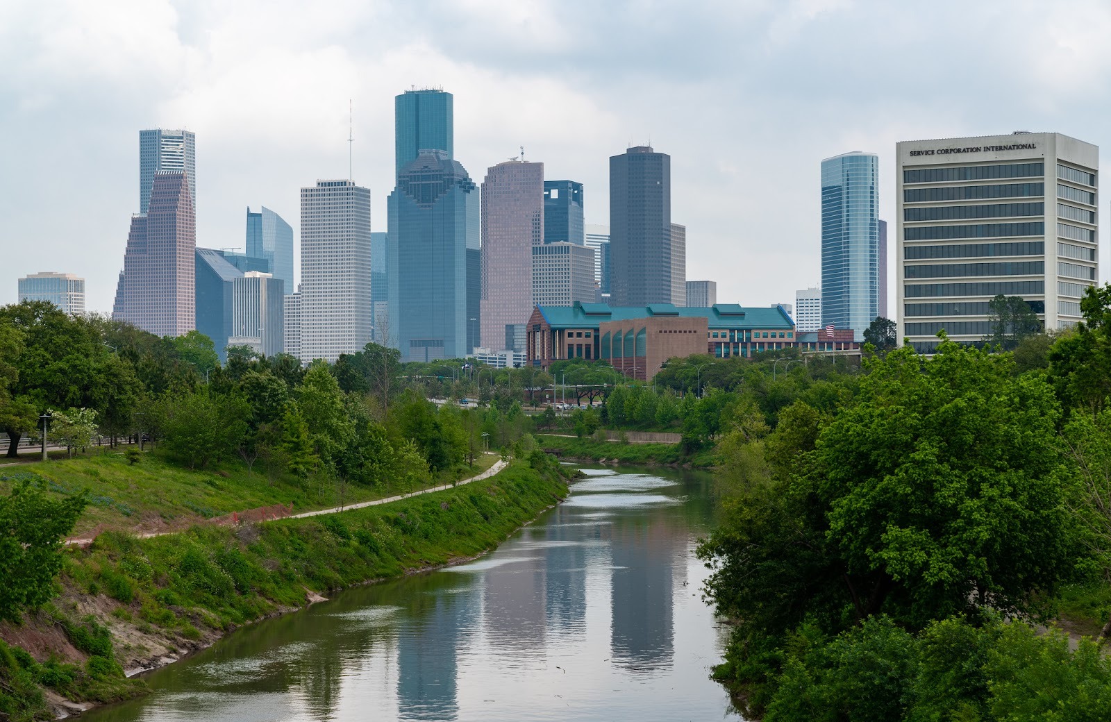 The downtown Houston skyline seen from a bridge in Buffalo Bayou Park.