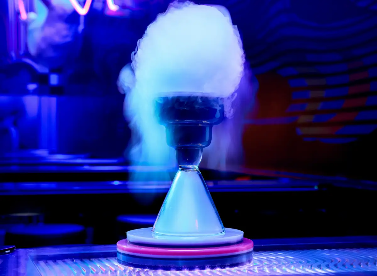 Smoking cocktail in a Las Vegas speakeasy at Datamosh in Omega Mart.