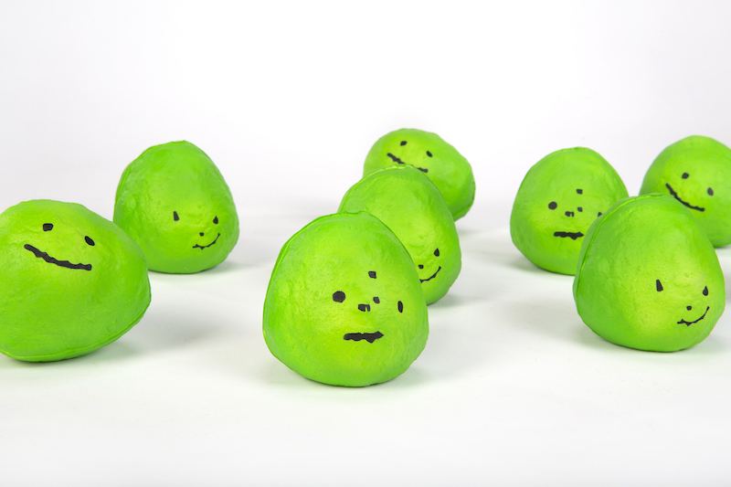 squishy looking limes with faces drawn on in sharpie