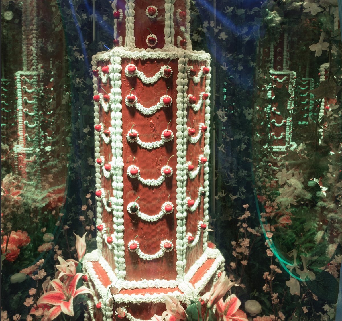 giant art cake at meow wolf red with cherries 10 anniversary