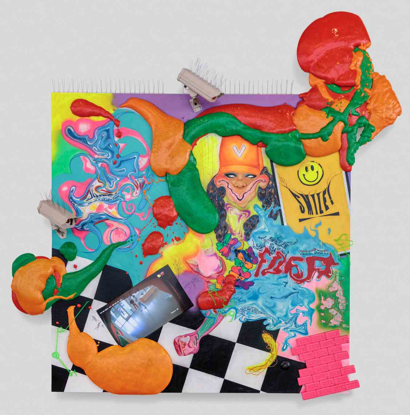 A bright, colorful collage of different textures and materials including pieces from a laundromat.