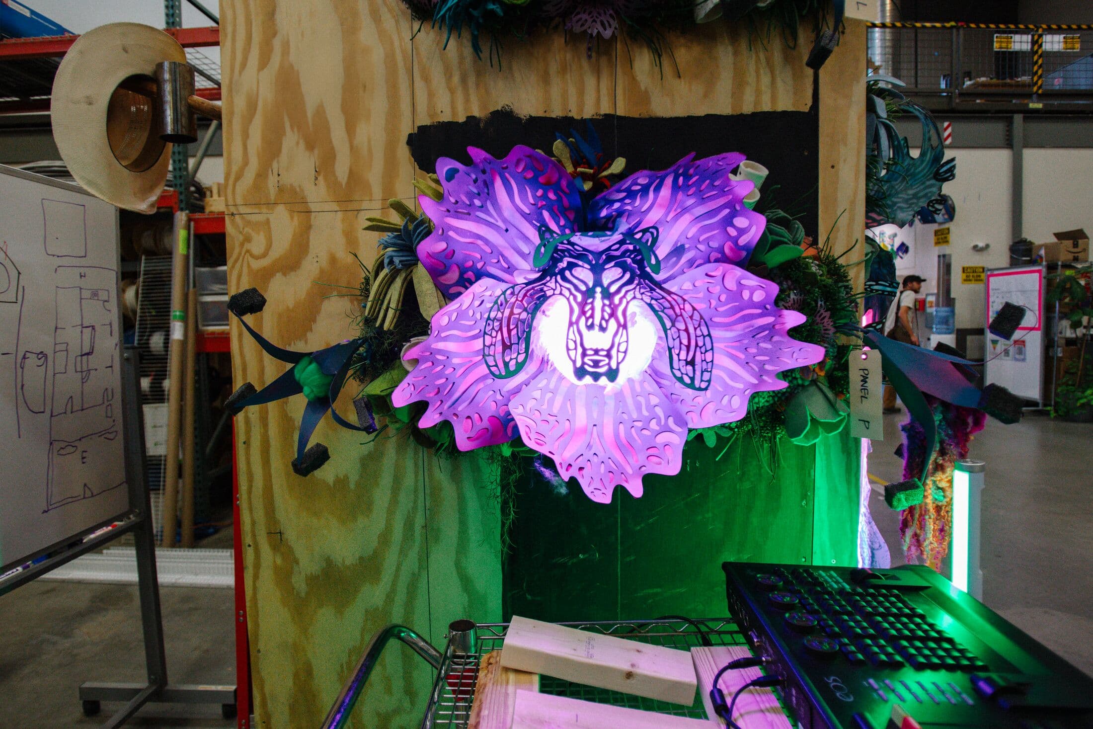 purple flower lit up in the center