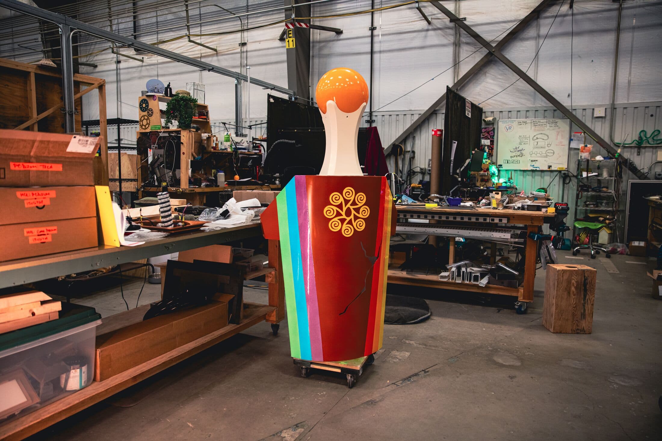 giant bowling pin in a warehouse space