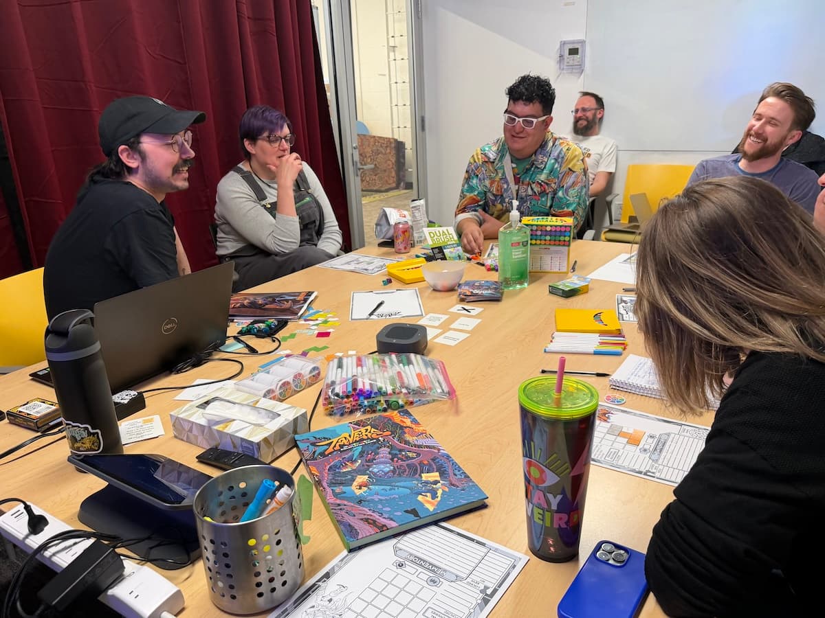 group of people around a table playing a game