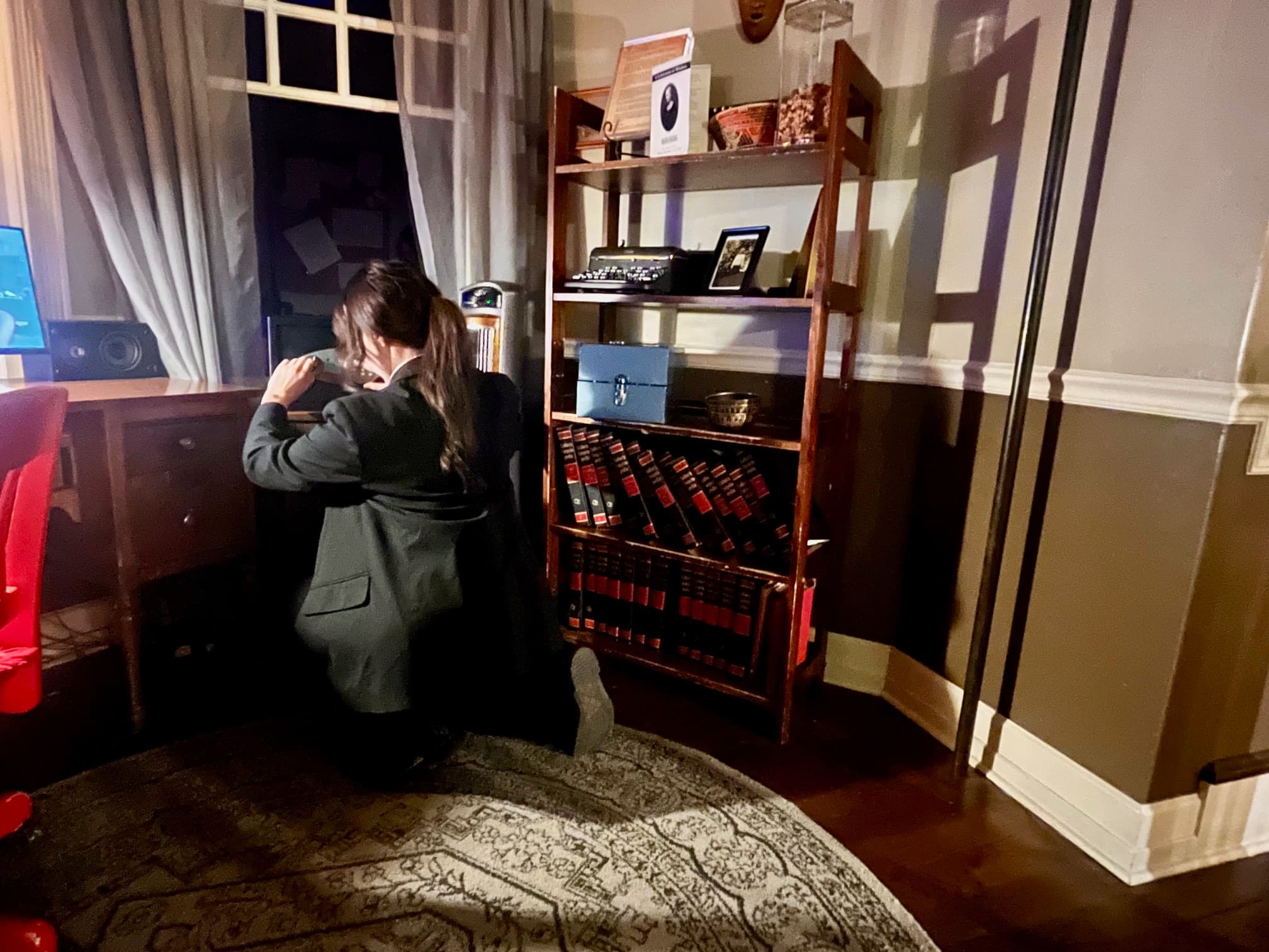 photo of investigator trying to open emerson’s safe