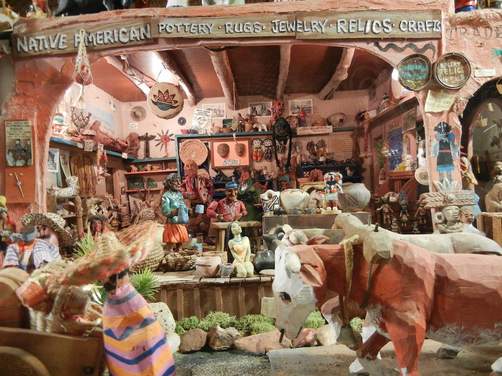 lots of jewelry, pottery, crafts, and relics in a shop at Tinkertown