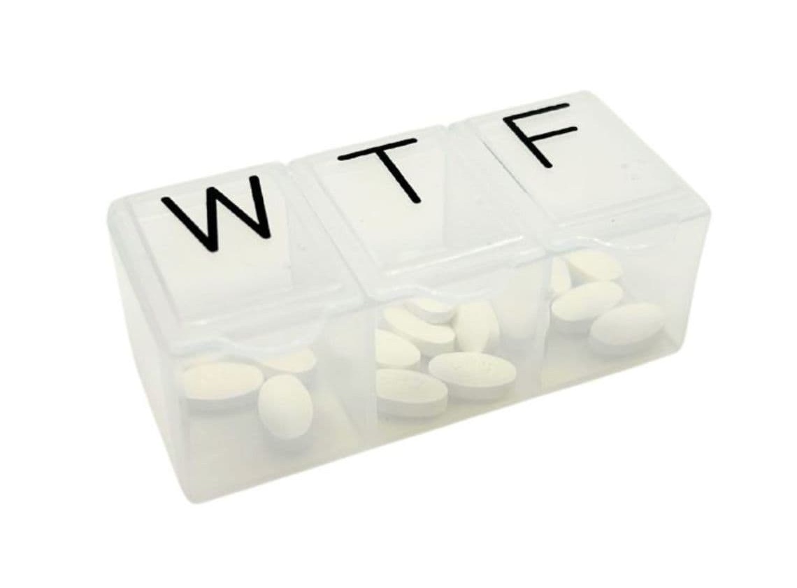 white pill container with the letters "WTF"