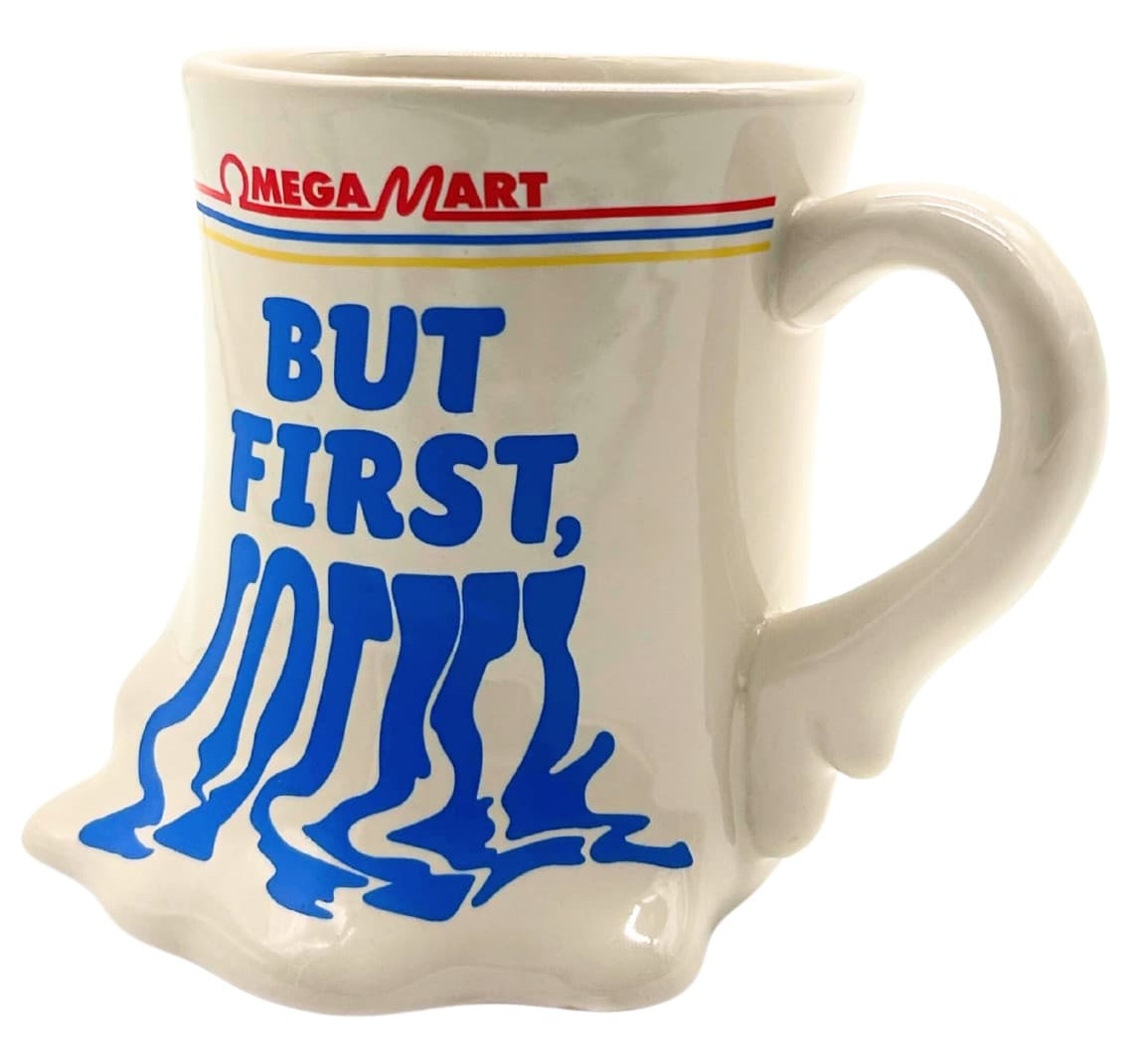 mug that says "Omega Mart but first, coffee" but the coffee is melting